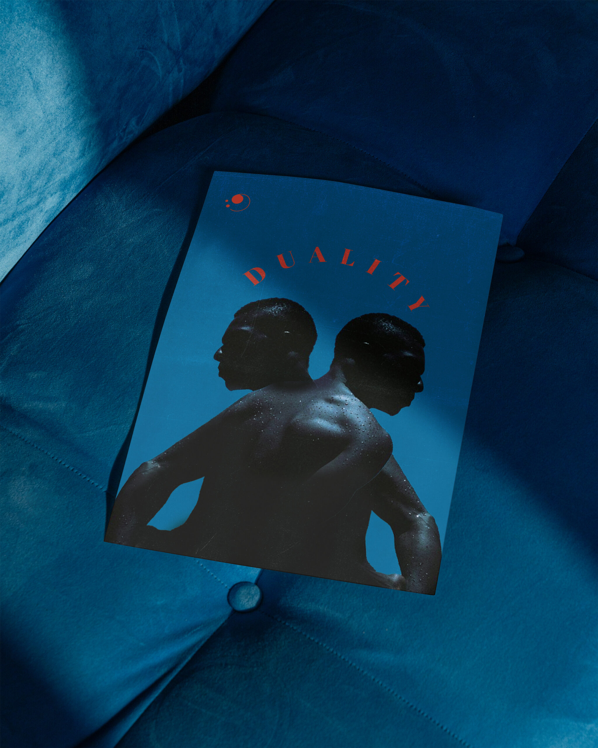 06-A3-Poster-on-a-Blue-Couch_DekGrafis